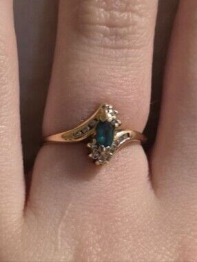 Gold Ring with Emerald Marquise Stone and Accent Diamonds